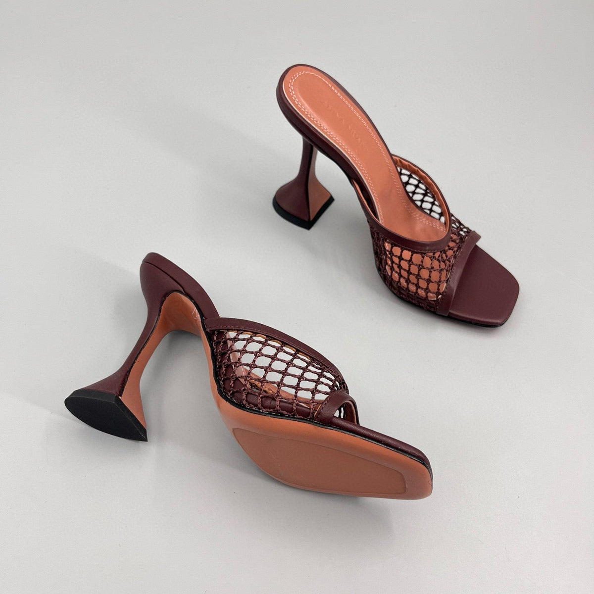 AMINA M HEELS