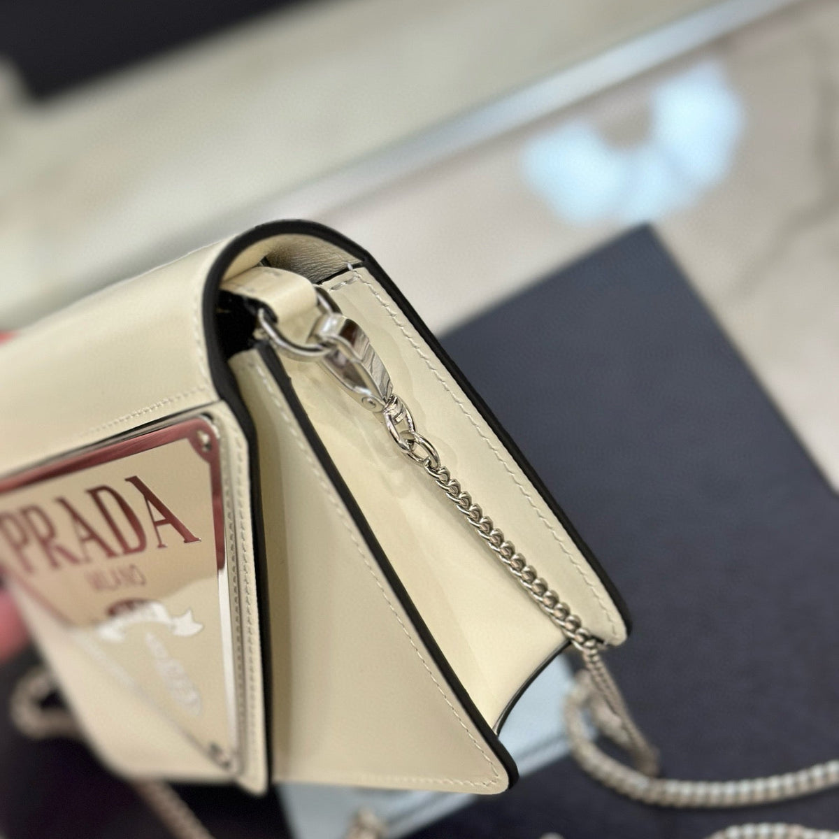 PD TRIANGLE LOGO BUFFED SHOULDER BAG