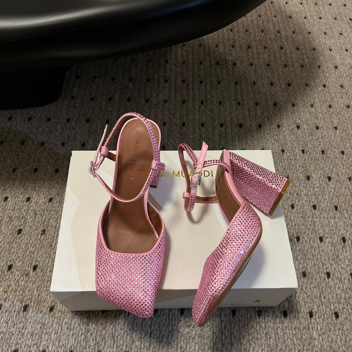 AMINA M HEELS