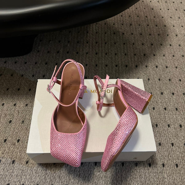 AMINA M HEELS
