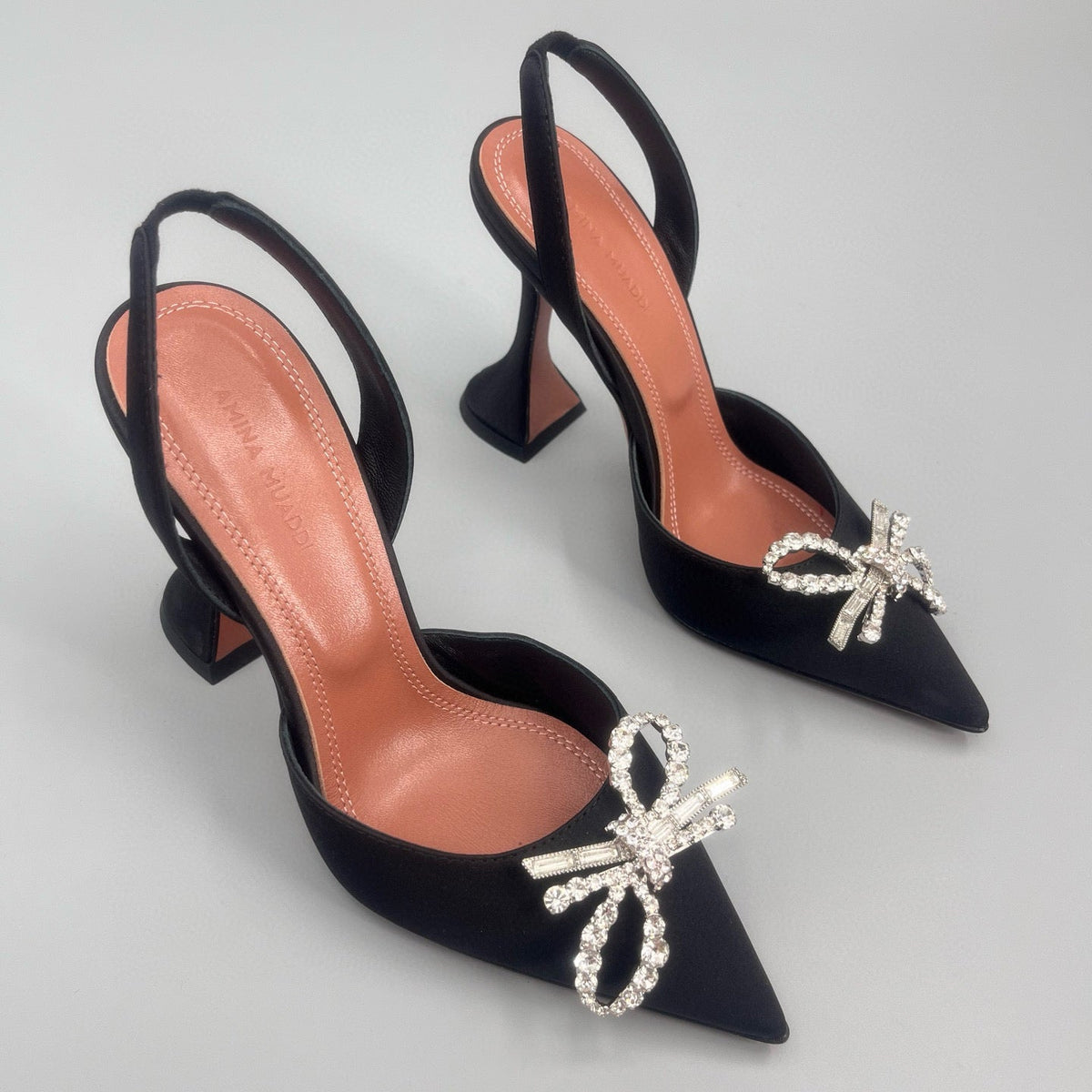 AMINA M HEELS
