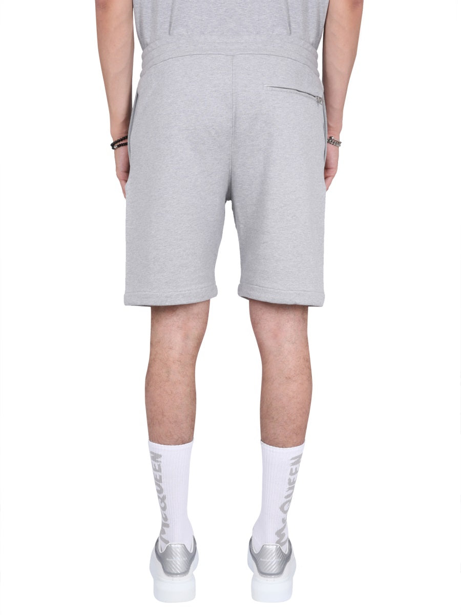 Alexander Mcqueen Men Bermuda Shorts With Graffiti Logo Print