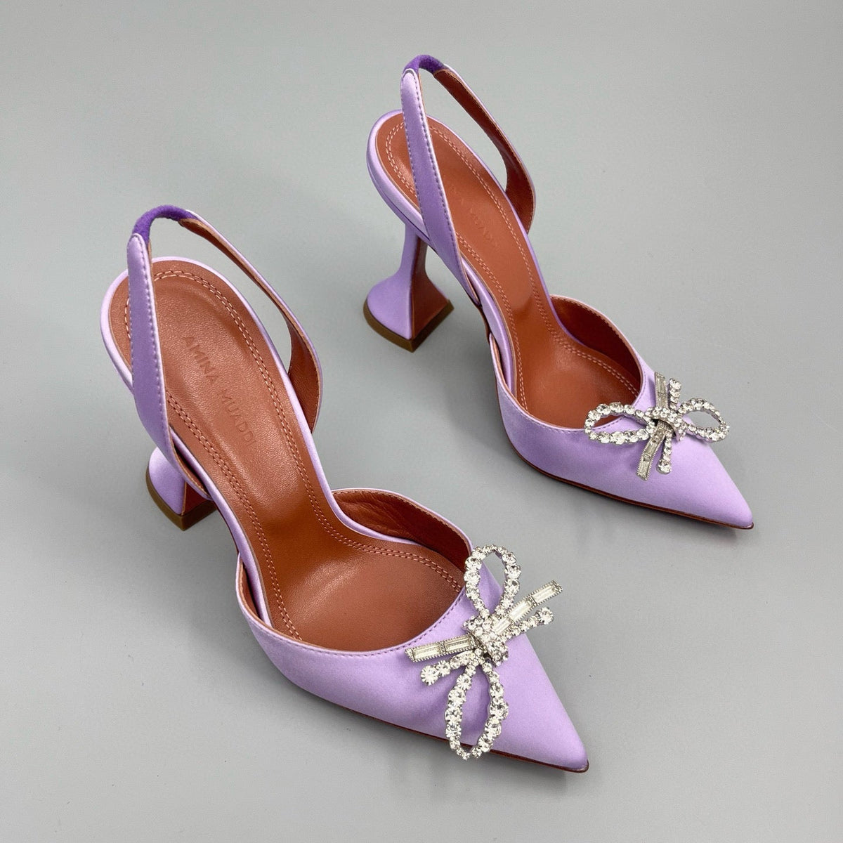 AMINA M HEELS