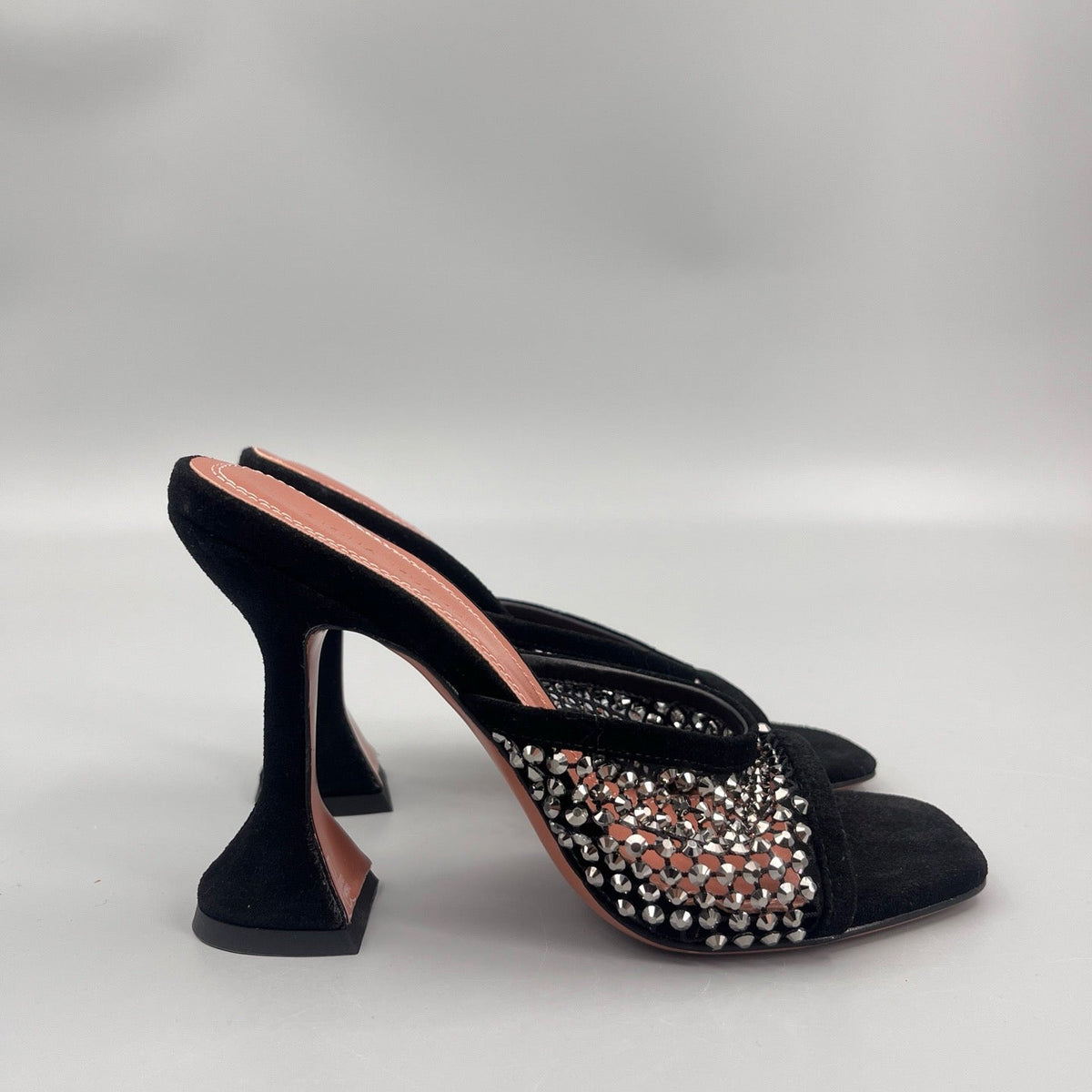 AMINA M HEELS