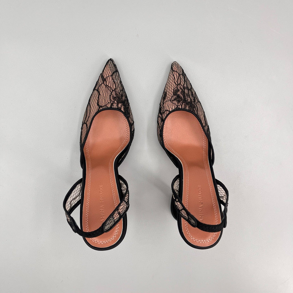AMINA M HEELS
