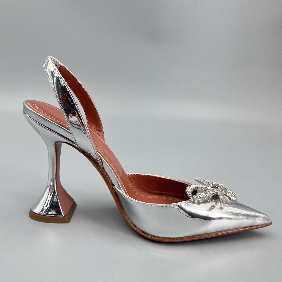 AMINA M HEELS