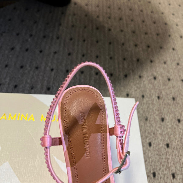 AMINA M HEELS