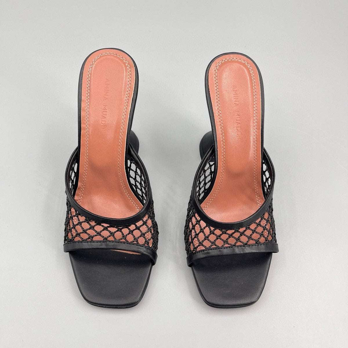 AMINA M HEELS