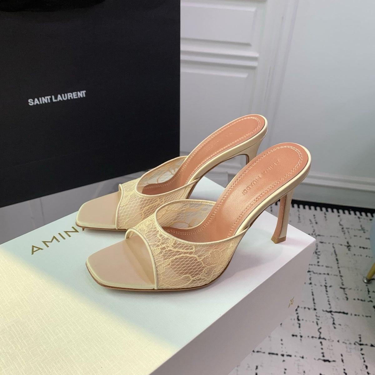 AMINA M HEELS
