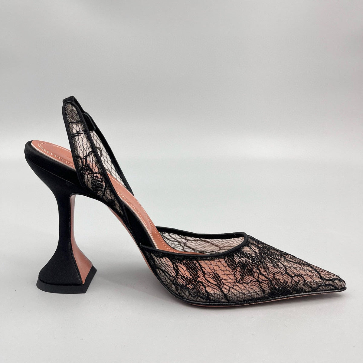 AMINA M HEELS