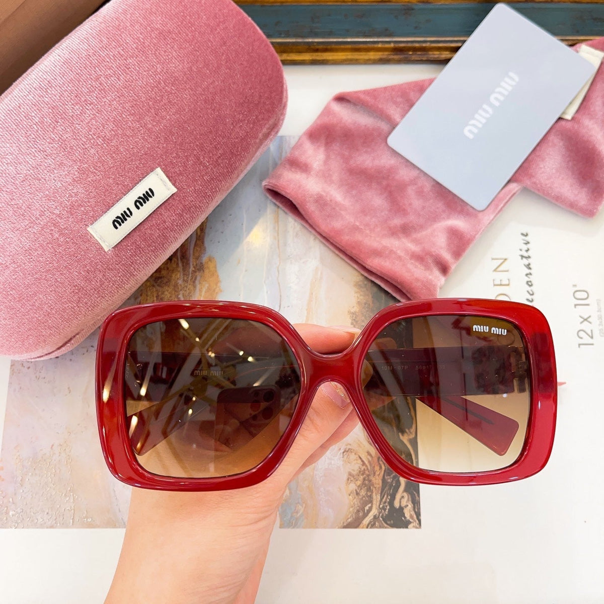 MIU M SUNGLASSES