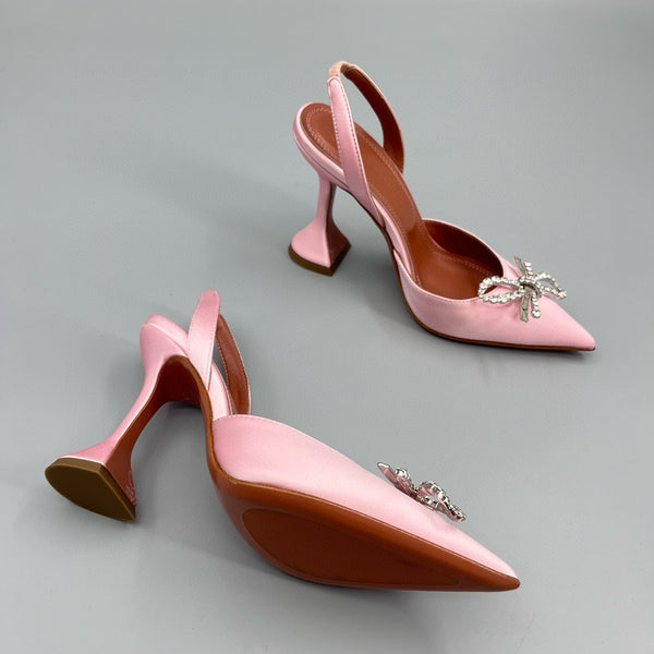 AMINA M HEELS