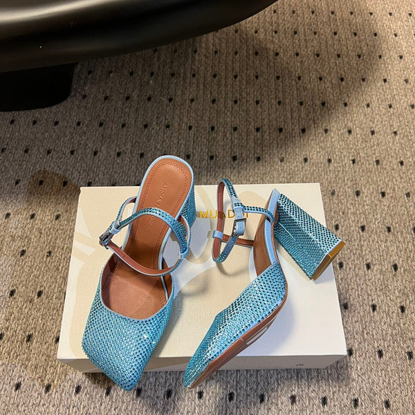 AMINA M HEELS