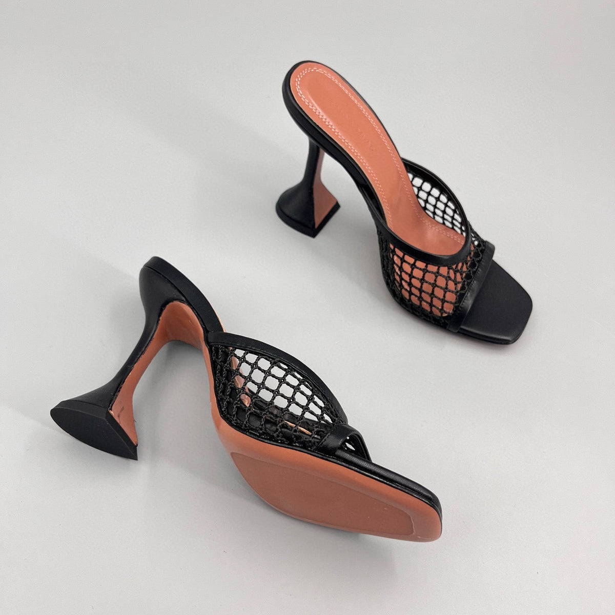 AMINA M HEELS