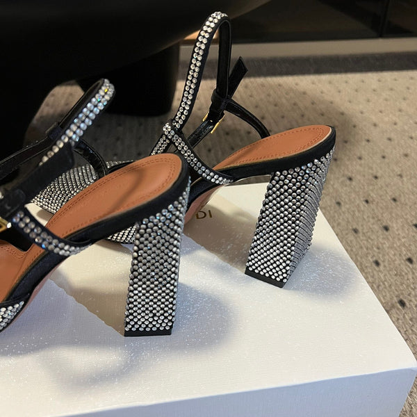 AMINA M HEELS