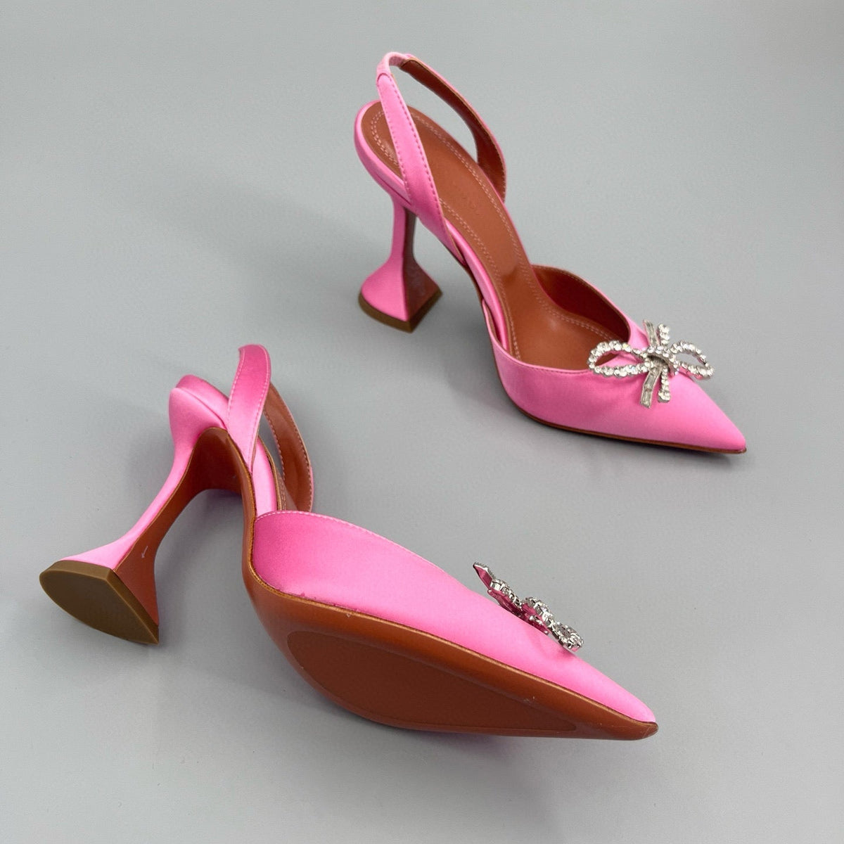 AMINA M HEELS