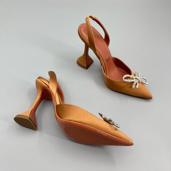 AMINA M HEELS