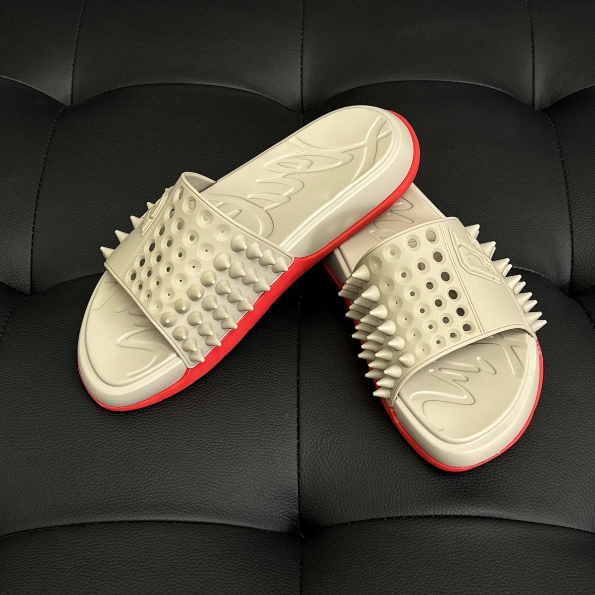 CL SPIKE SLIDES