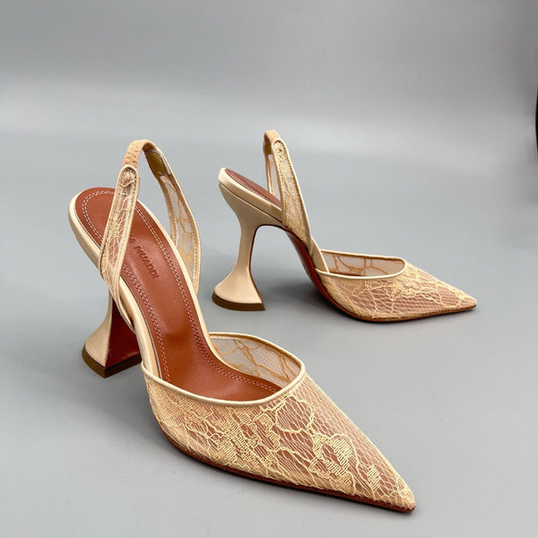 AMINA M HEELS