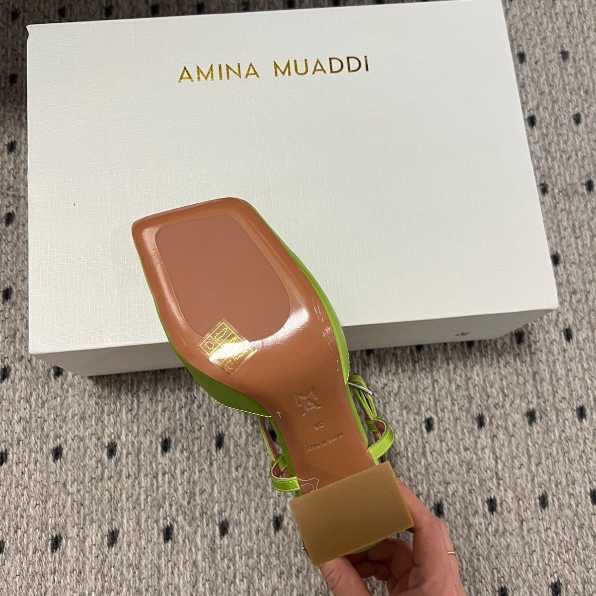 AMINA M HEELS