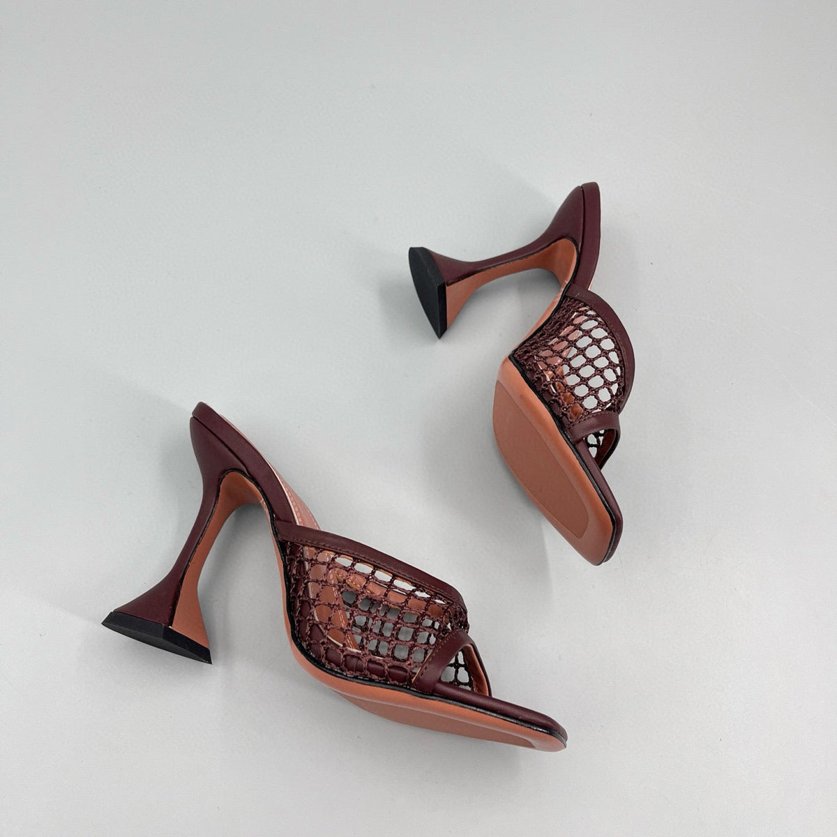 AMINA M HEELS