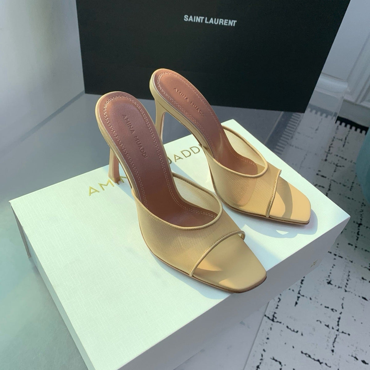AMINA M HEELS