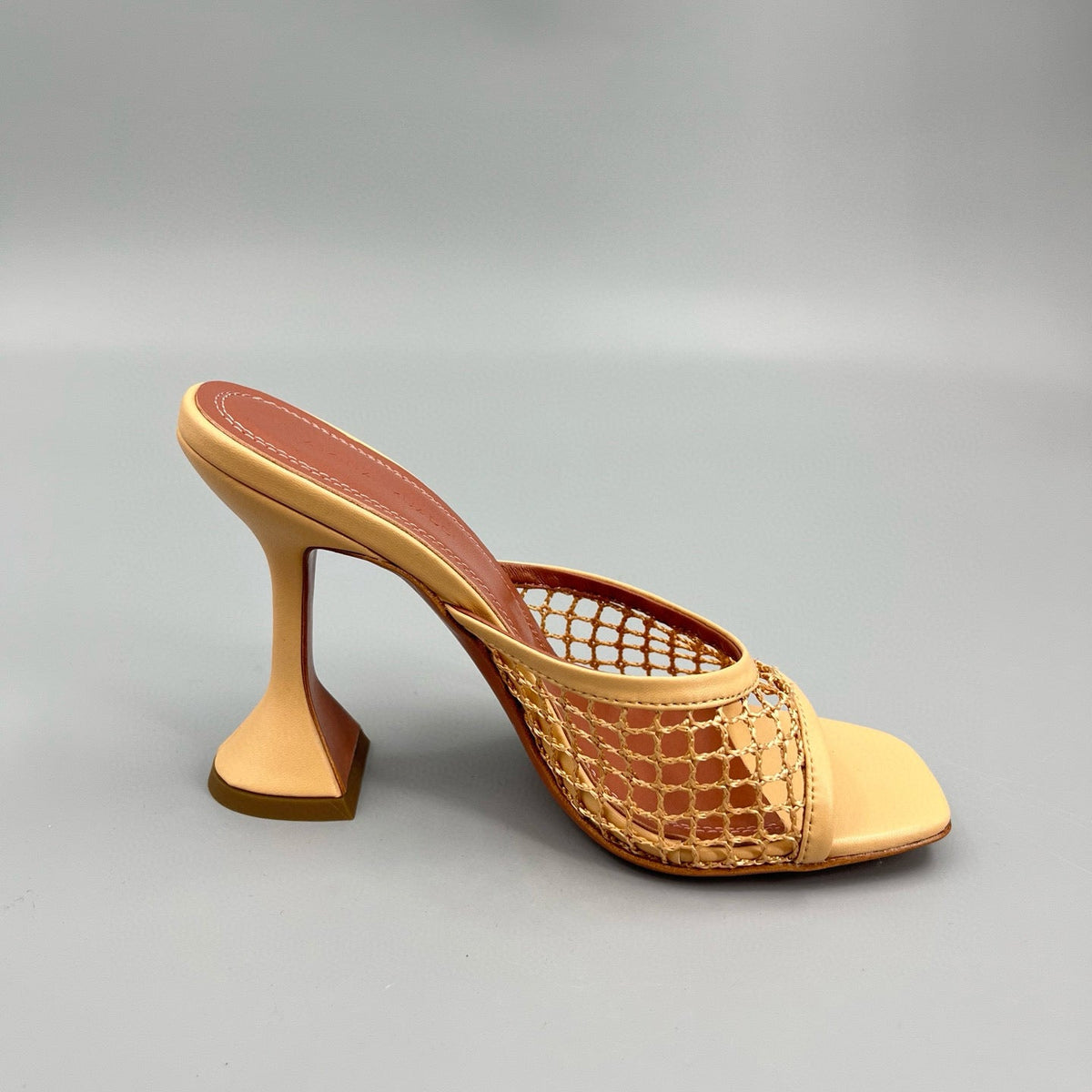 AMINA M HEELS