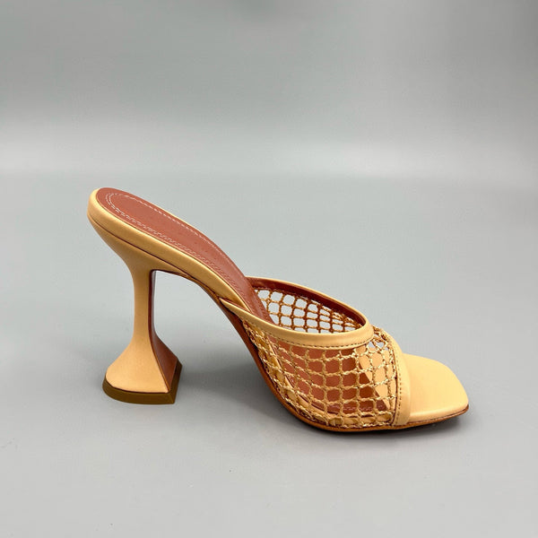 AMINA M HEELS