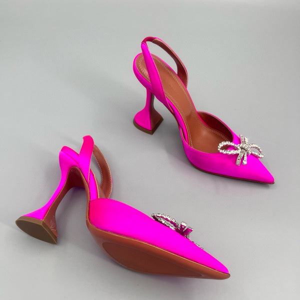 AMINA M HEELS