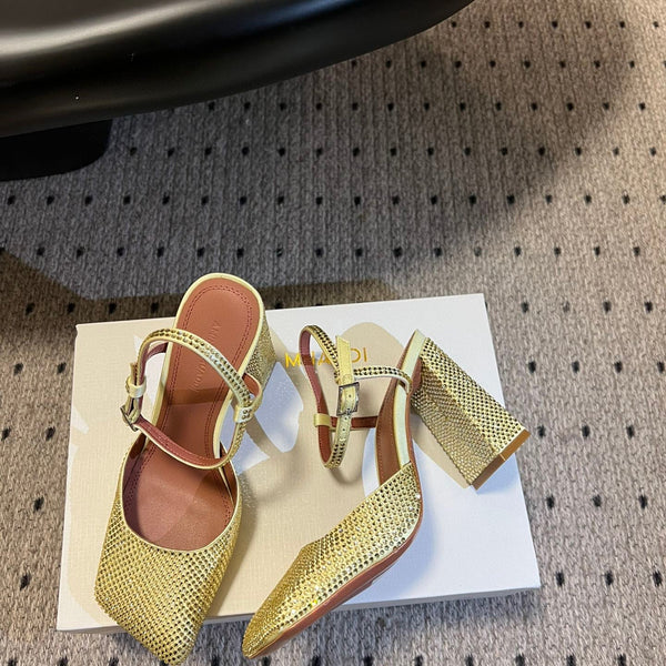 AMINA M HEELS