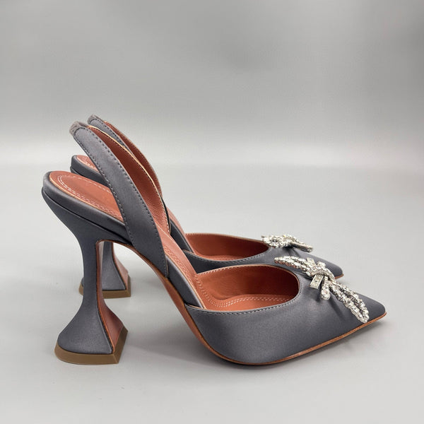 AMINA M HEELS