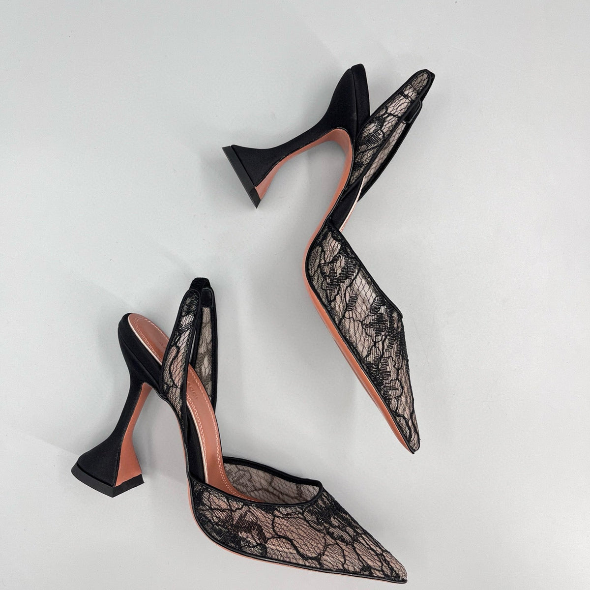 AMINA M HEELS