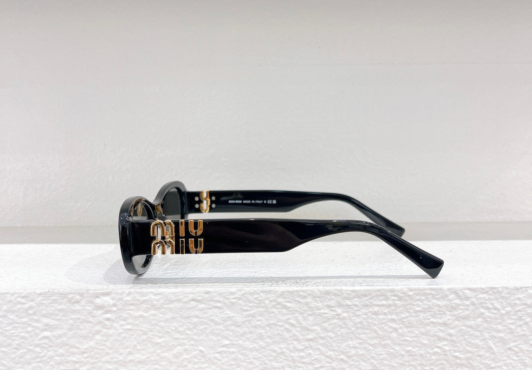 MIU M SUNGLASSES