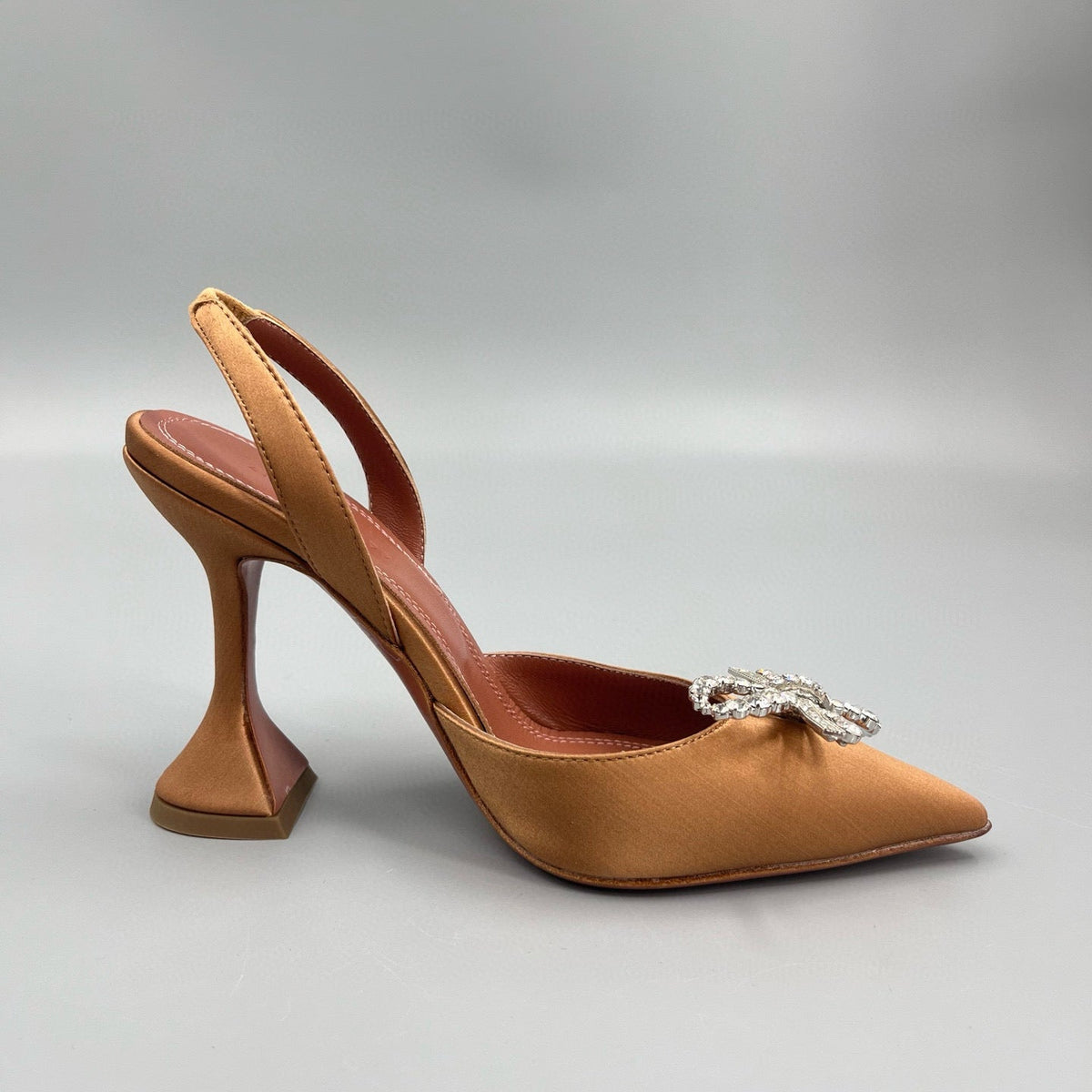 AMINA M HEELS