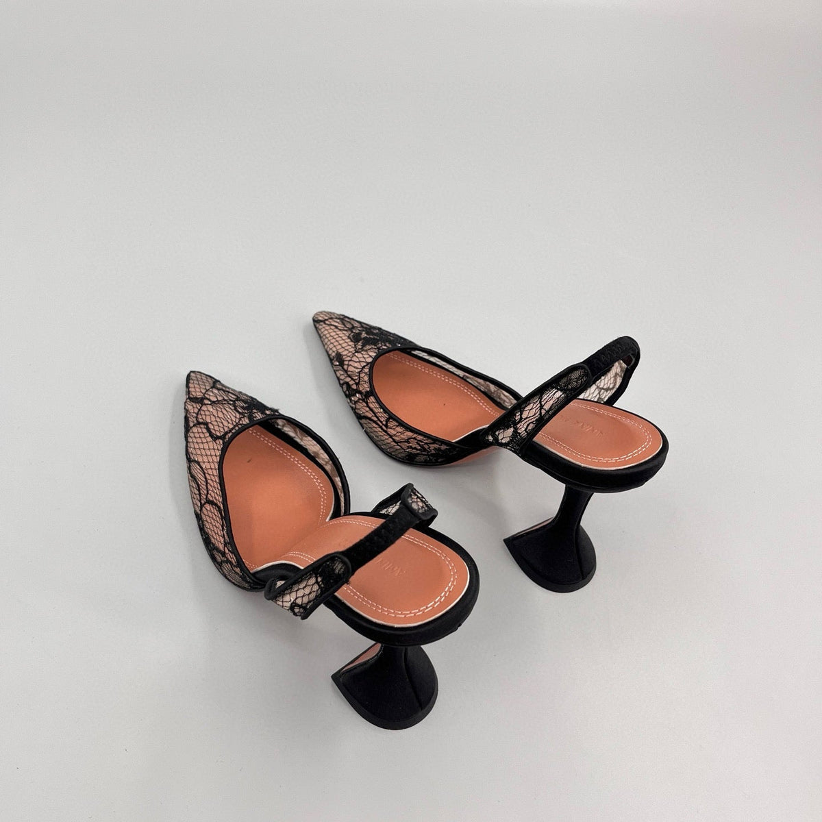 AMINA M HEELS