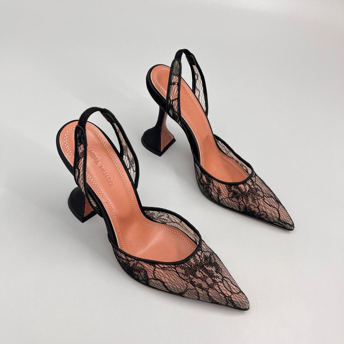 AMINA M HEELS