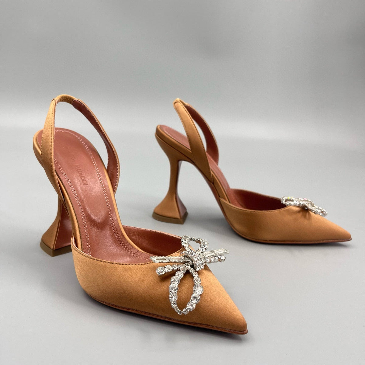 AMINA M HEELS
