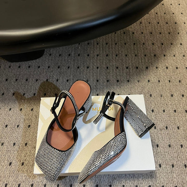 AMINA M HEELS