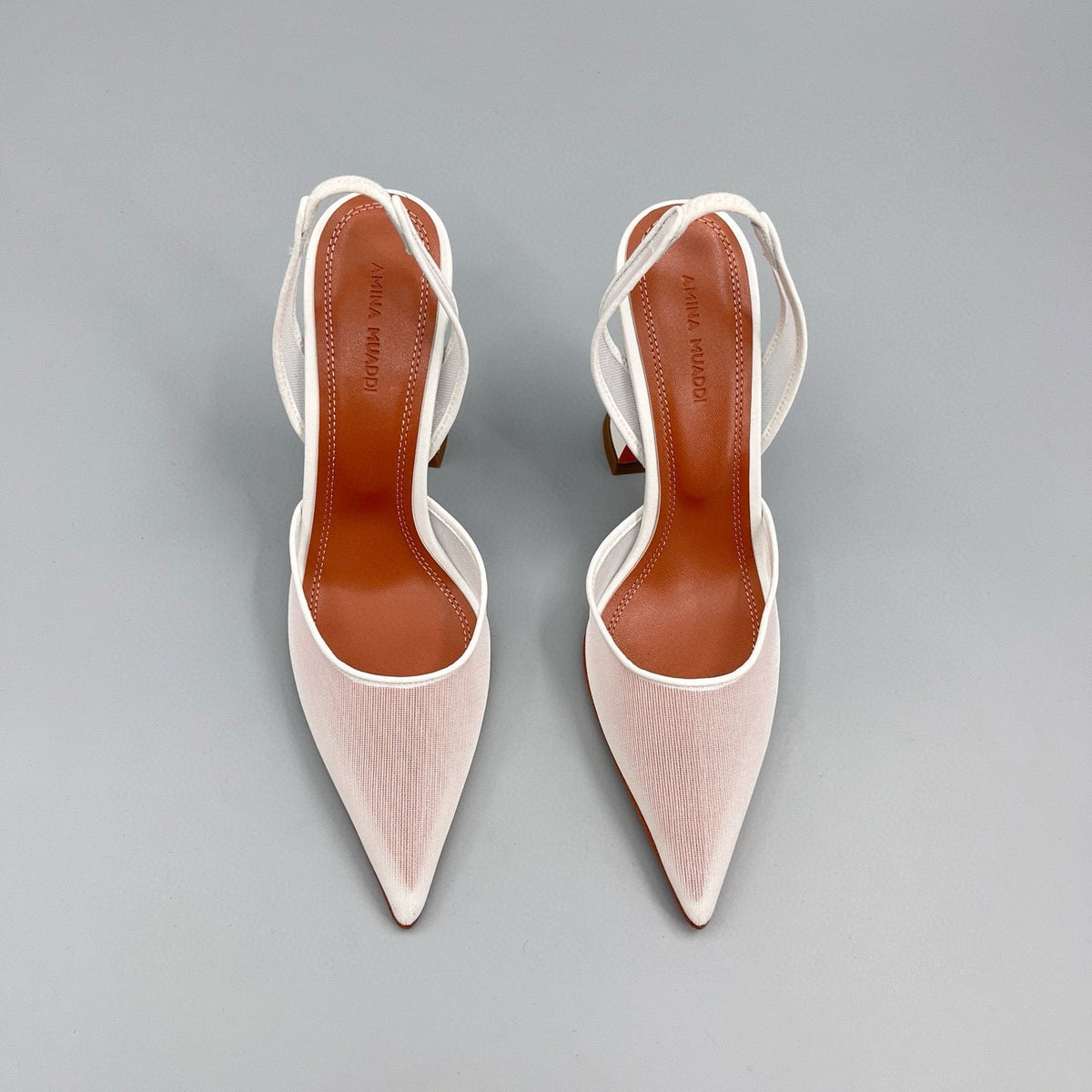AMINA M HEELS