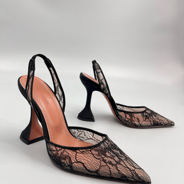 AMINA M HEELS