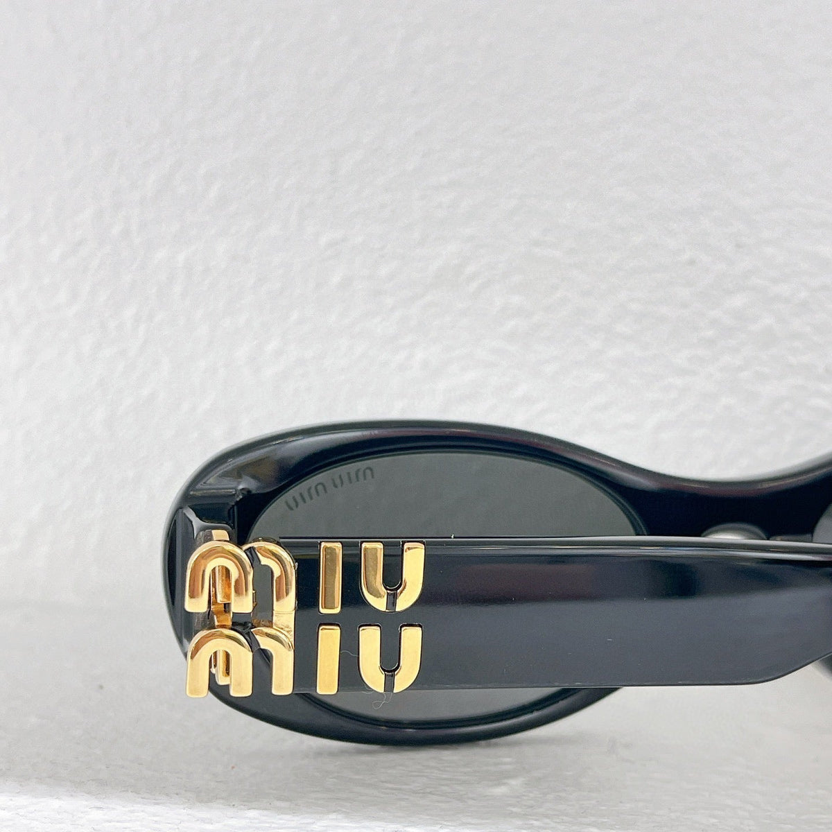 MIU M SUNGLASSES