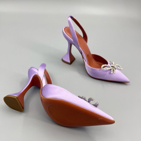 AMINA M HEELS