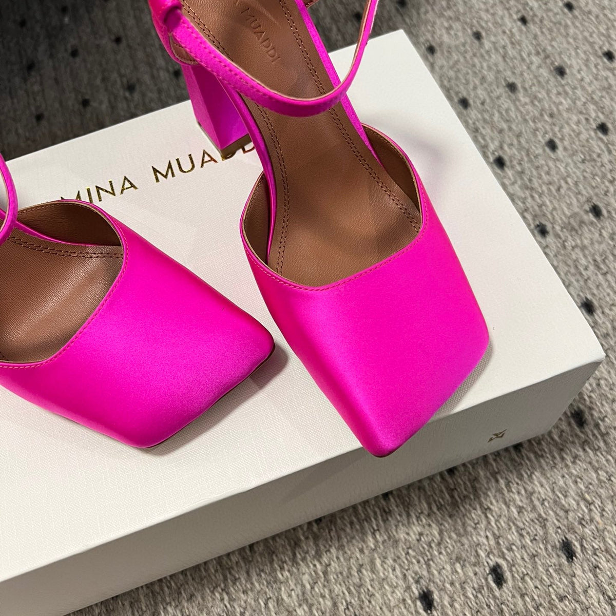 AMINA M HEELS