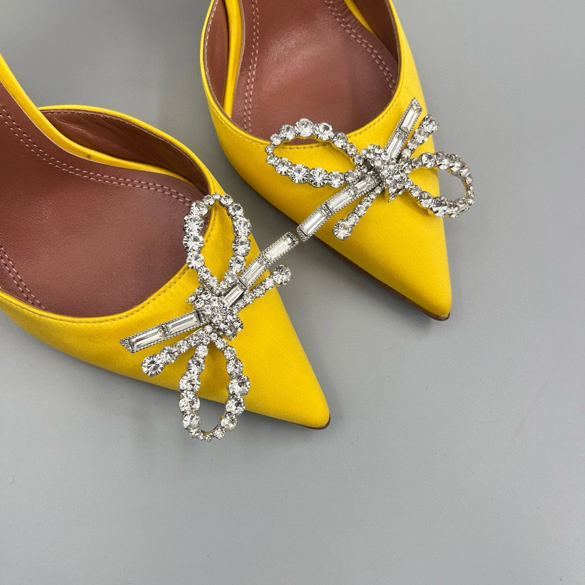 AMINA M HEELS