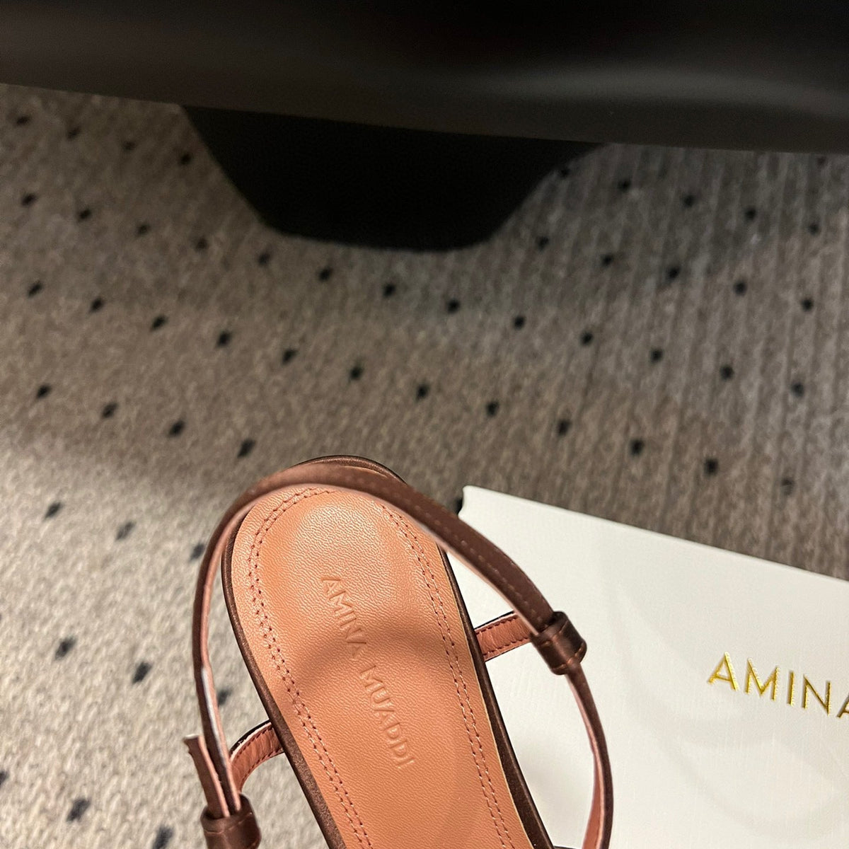 AMINA M HEELS