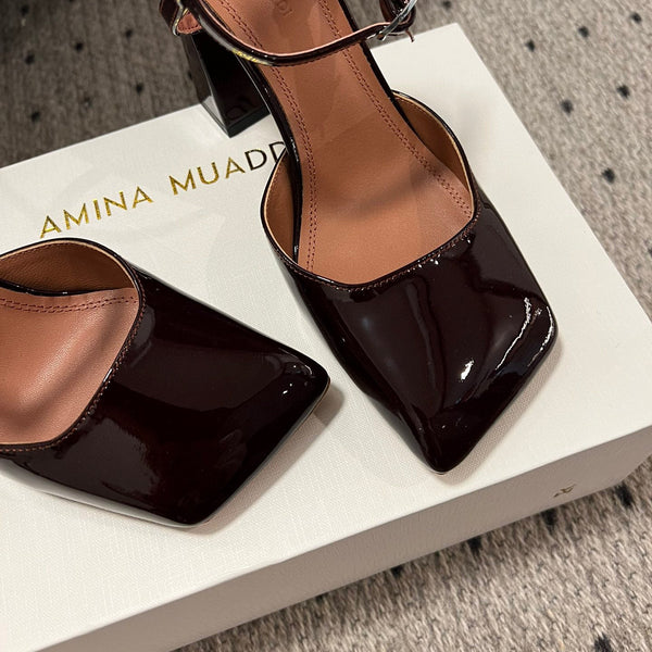 AMINA M HEELS