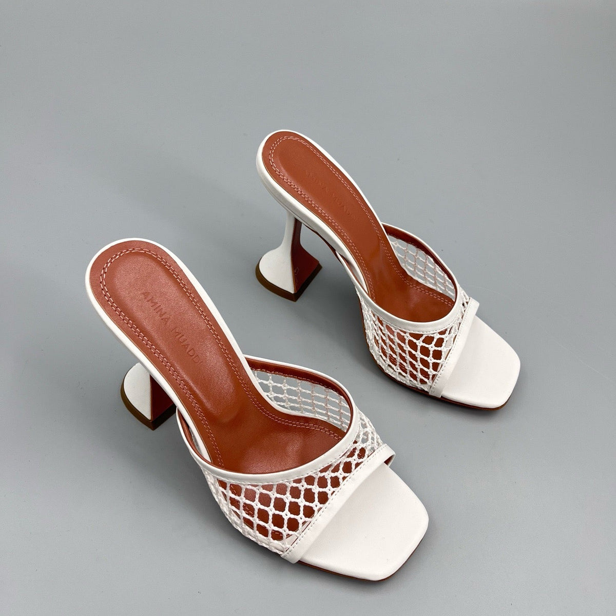 AMINA M HEELS