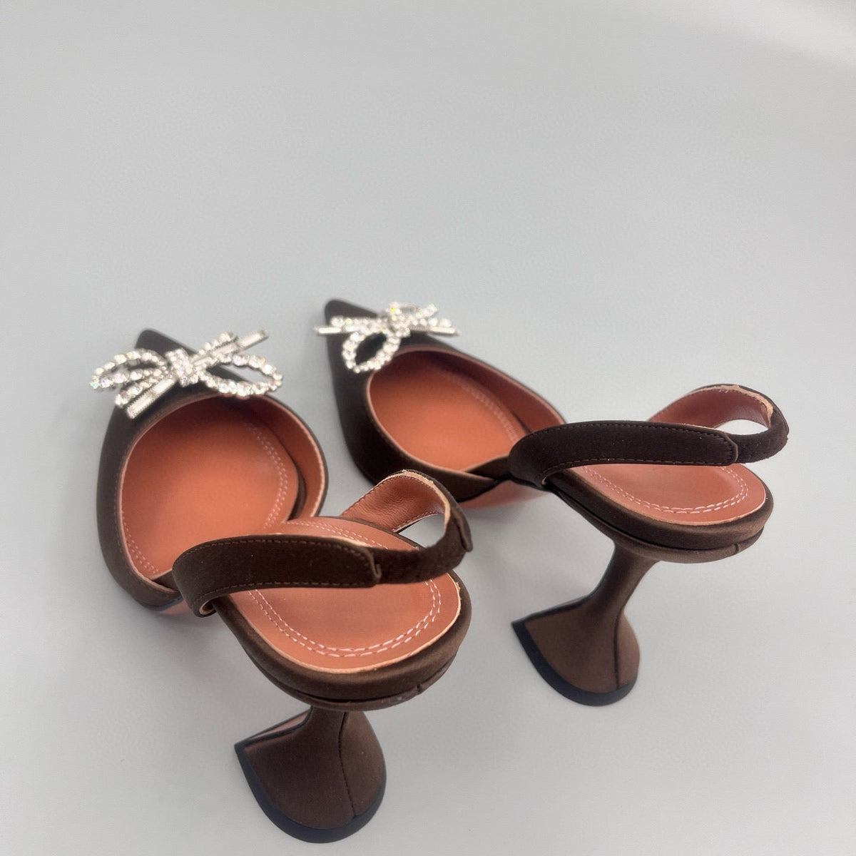 AMINA M HEELS