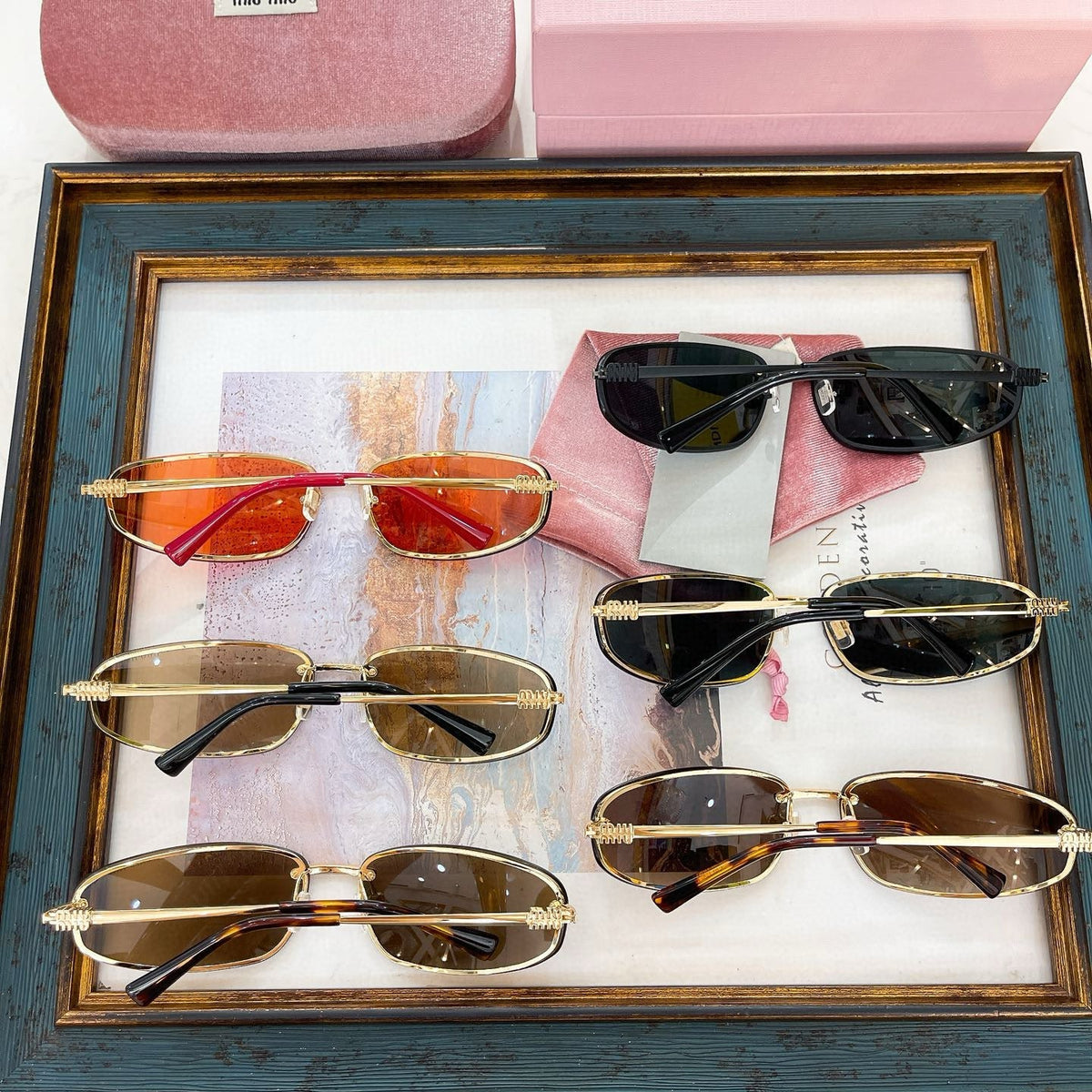 MIU M SUNGLASSES