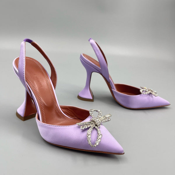 AMINA M HEELS
